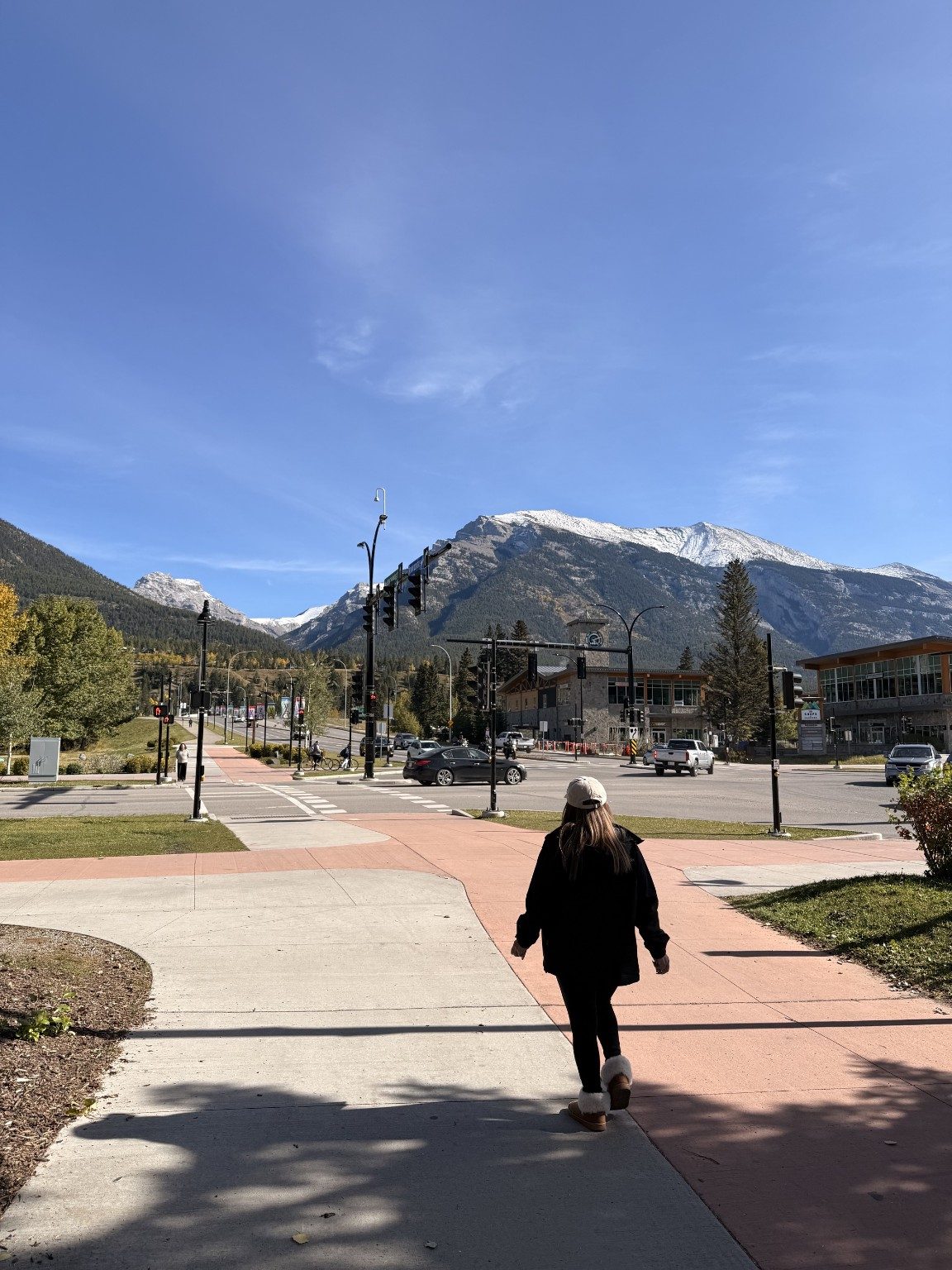 A walk through Canmore with mountains ahead